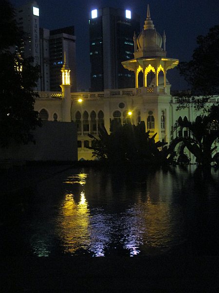 View looking over the swimming pool at The Majestic Hotel Kuala Lumpur, looking at the old Morrish Railway Station