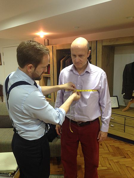 Stowers, 13 Savile Row, London: Bespoke Tailors - Michael Grenville being measured by Lee